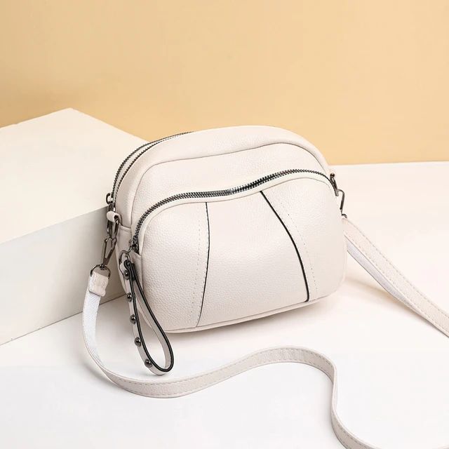 Solid Color Fashionable Rivet Zipper Women's Mobile Phone Bag Simple Soft